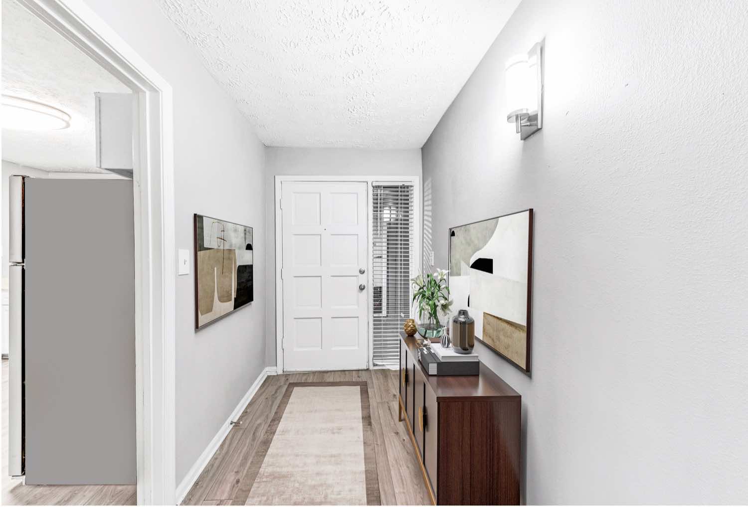 model entry-way with wood-style flooring