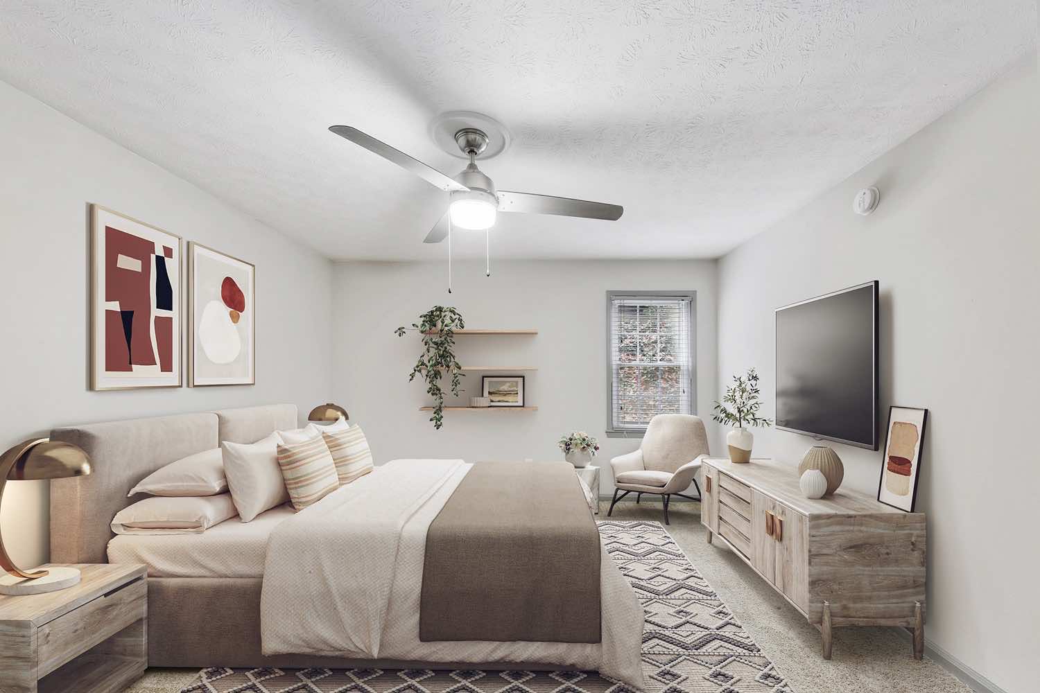 model bedroom with wood-style flooring and ceiling fan