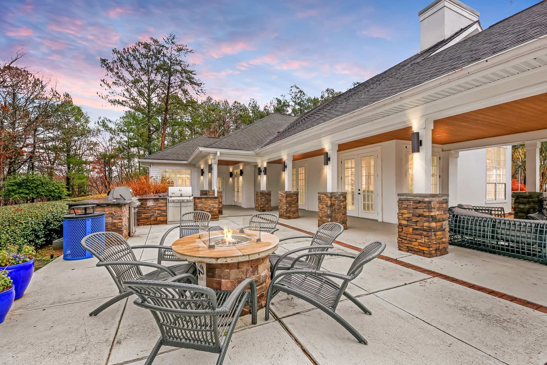 exterior view of clubhouse patio and fire pit