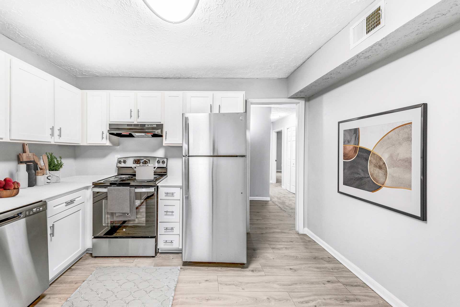 kitchen with woods-style flooring