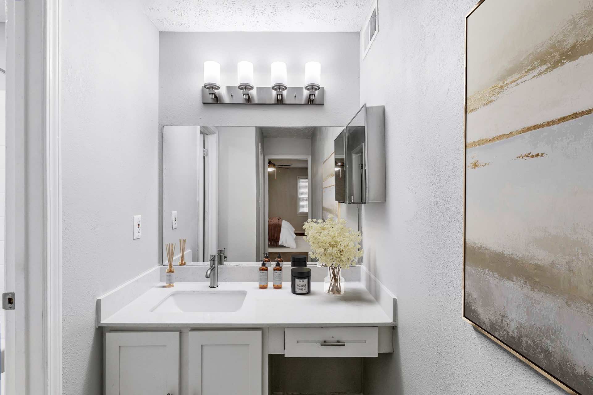 bathroom with quartz counter